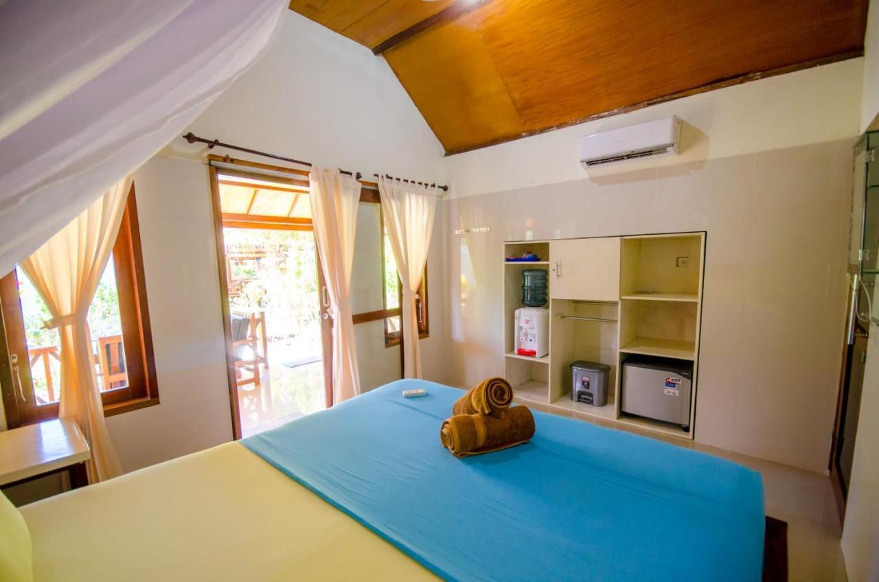 Fantastic Cottages Gili Meno Extérieur photo