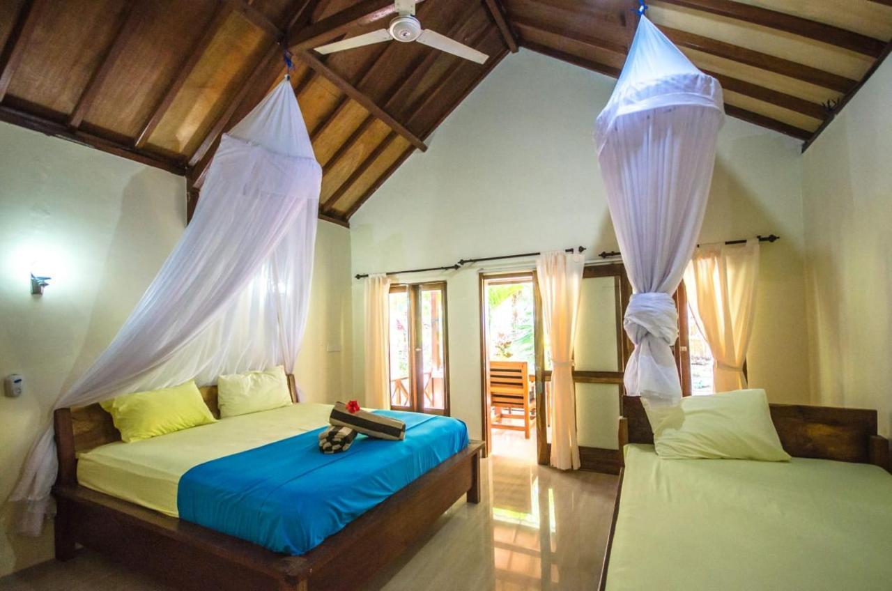 Fantastic Cottages Gili Meno Extérieur photo